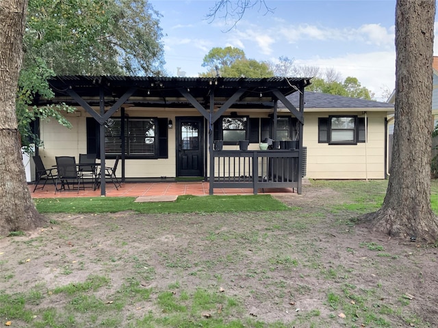 rear view of house featuring a patio area