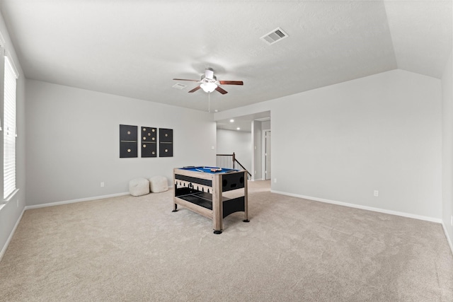 game room featuring carpet floors, a ceiling fan, baseboards, and visible vents