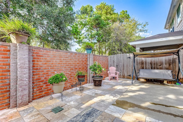 view of patio featuring a fenced backyard