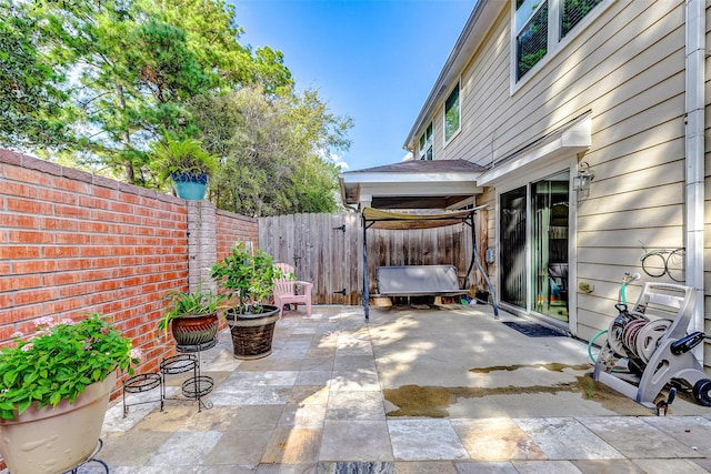 view of patio / terrace with fence