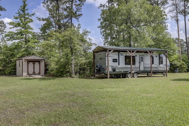 view of yard with an outdoor structure and a shed