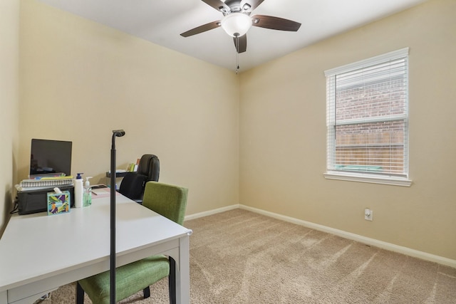 office with baseboards, ceiling fan, and carpet