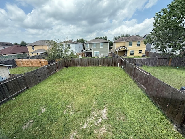 8127 Chancewood Ln, Humble, TX 77338 - view of yard featuring a residential view and a fenced backyard