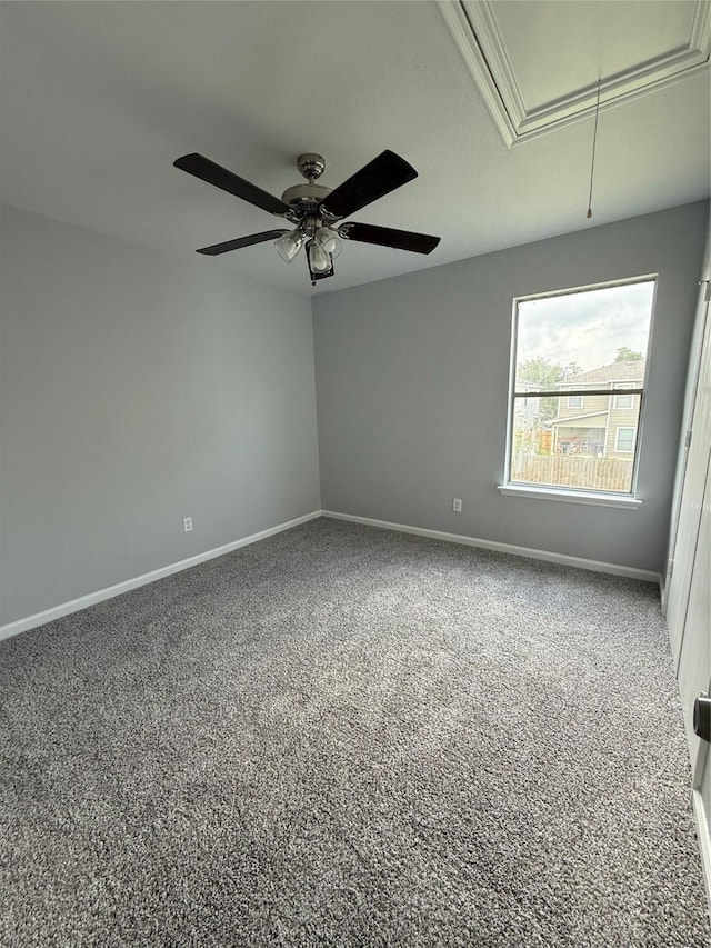 8127 Chancewood Ln, Humble, TX 77338 - empty room with a ceiling fan, baseboards, carpet, and attic access