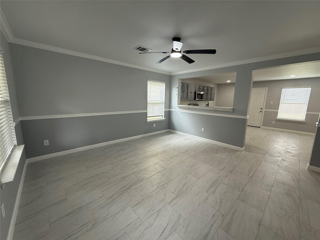 8127 Chancewood Ln, Humble, TX 77338 - unfurnished living room with a ceiling fan, baseboards, and ornamental molding
