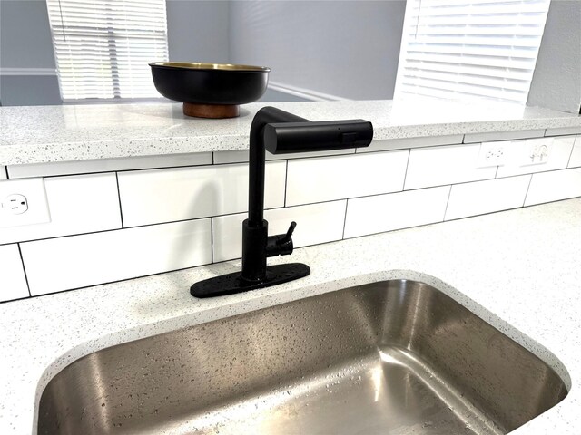 8127 Chancewood Ln, Humble, TX 77338 - kitchen view of a sink and backsplash