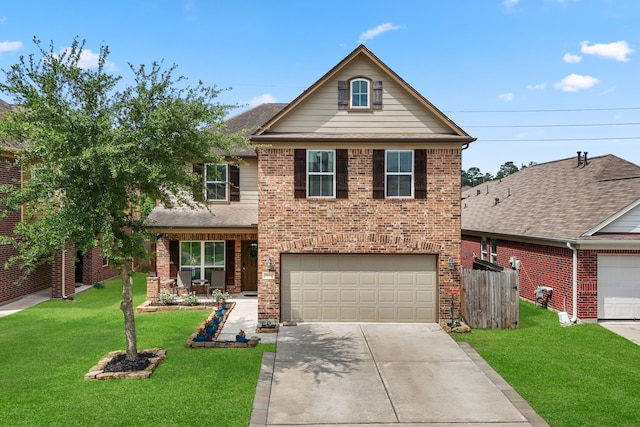 traditional-style house featuring brick siding, a front lawn, an attached garage, and driveway