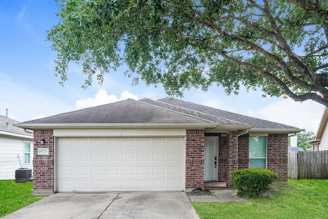 single story home with roof with shingles, brick siding, fence, concrete driveway, and an attached garage