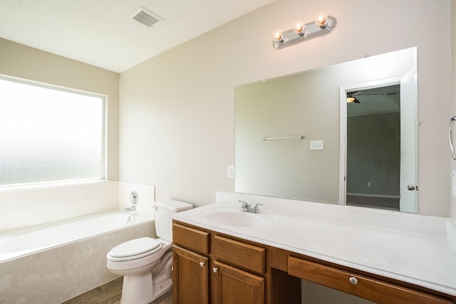full bath with ceiling fan, vanity, toilet, visible vents, and a bath