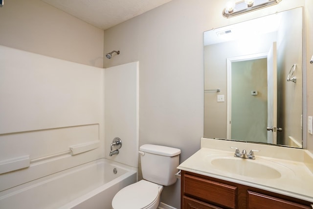 bathroom featuring toilet, visible vents, bathing tub / shower combination, and vanity