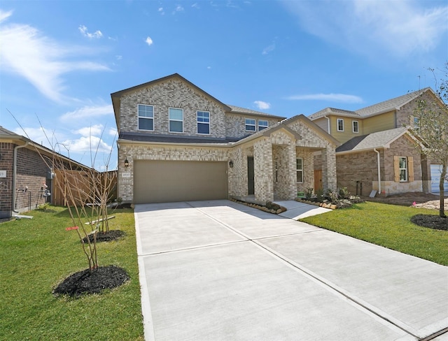 view of front of house featuring brick siding, a garage, a front lawn, and concrete driveway