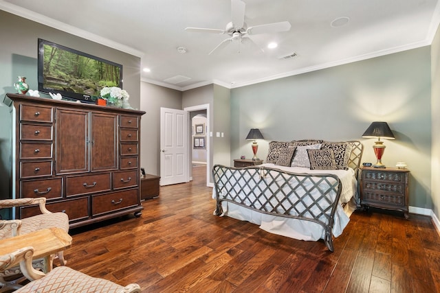 bedroom with dark wood finished floors, recessed lighting, baseboards, visible vents, and ornamental molding