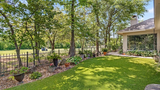 view of yard featuring fence