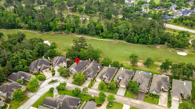 birds eye view of property featuring a residential view and golf course view