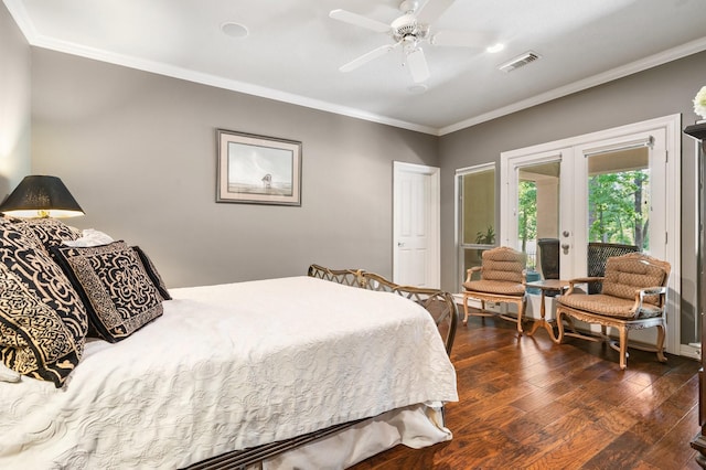 bedroom with visible vents, ornamental molding, ceiling fan, dark wood-type flooring, and french doors