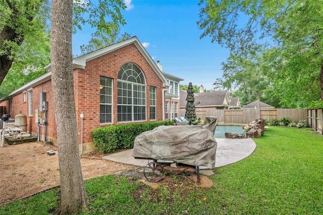view of yard featuring a fenced backyard and a fenced in pool