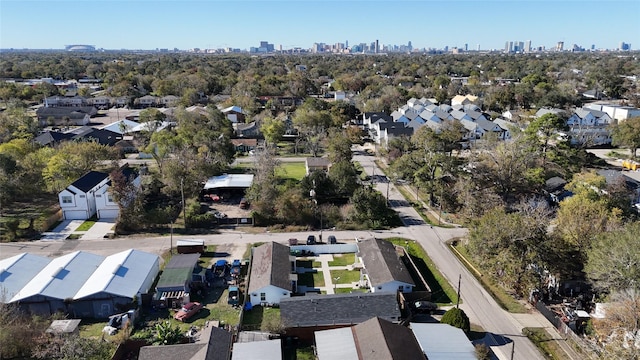 drone / aerial view featuring a residential view and a view of city