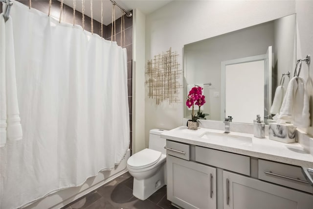 full bathroom with vanity, tile patterned flooring, shower / bath combination with curtain, and toilet