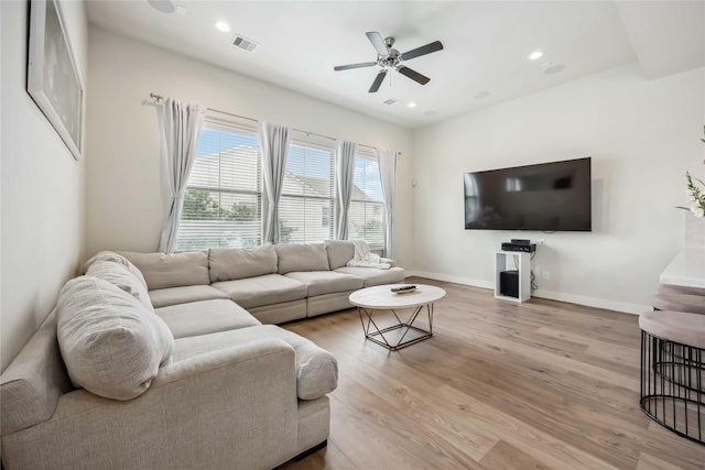 living area with ceiling fan, light wood finished floors, recessed lighting, baseboards, and visible vents