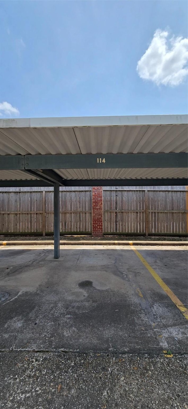 2350 Bering Dr Unit 114, Houston, TX 77057 - covered parking lot featuring fence