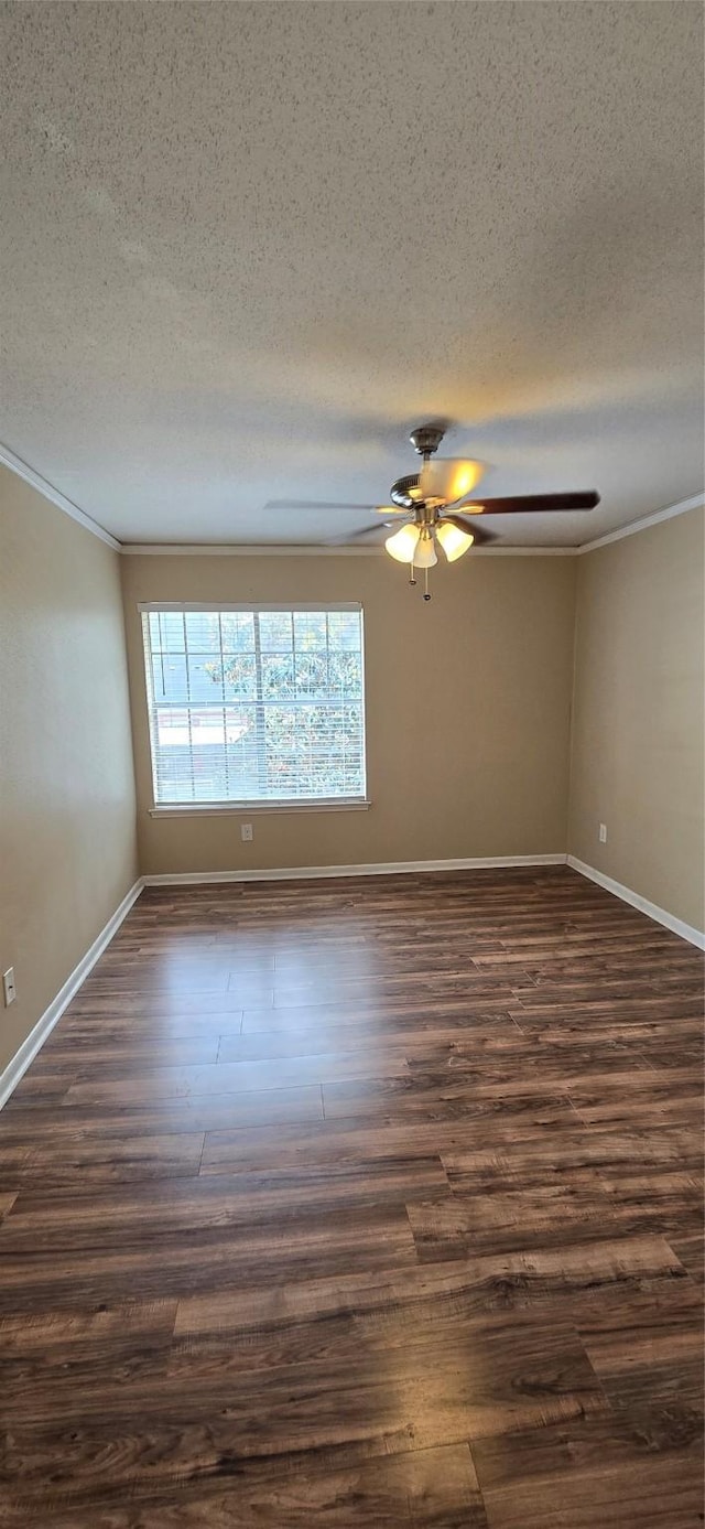 2350 Bering Dr Unit 114, Houston, TX 77057 - spare room featuring ceiling fan, ornamental molding, a textured ceiling, and dark wood-type flooring