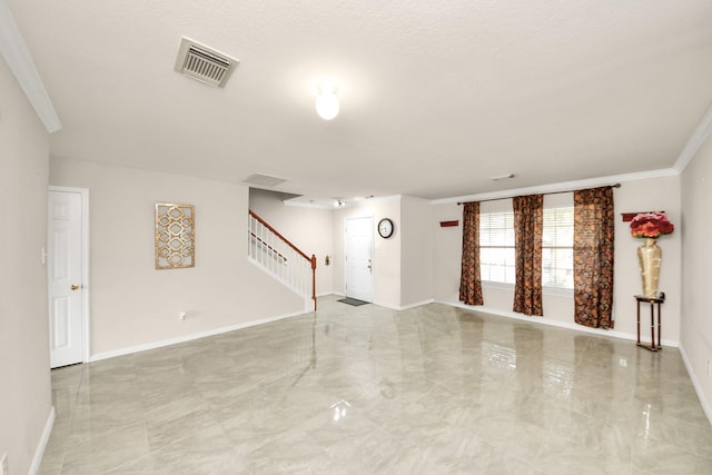 unfurnished living room featuring crown molding, baseboards, stairs, and visible vents