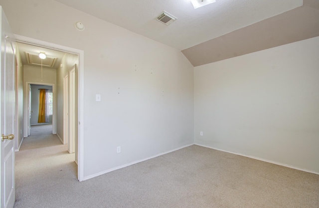 18303 Melissa Springs Dr, Tomball, TX 77375 - empty room with carpet floors, attic access, baseboards, and visible vents