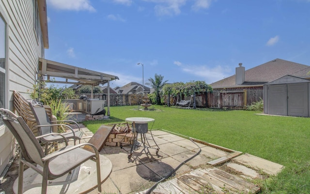 18303 Melissa Springs Dr, Tomball, TX 77375 - view of patio with a storage shed, an outdoor structure, and a fenced backyard