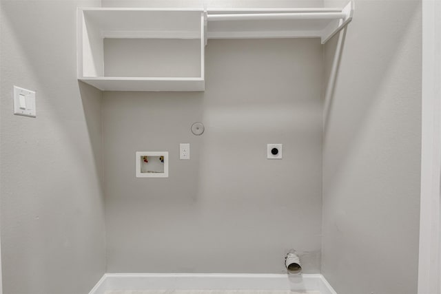 washroom with laundry area, hookup for a washing machine, gas dryer hookup, electric dryer hookup, and baseboards