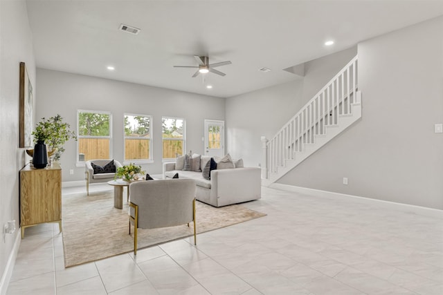 8159 Crestview Dr, Houston, TX 77028 - living area featuring ceiling fan, baseboards, stairs, and recessed lighting