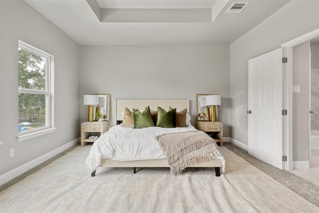 8159 Crestview Dr, Houston, TX 77028 - bedroom with light carpet, baseboards, and a raised ceiling