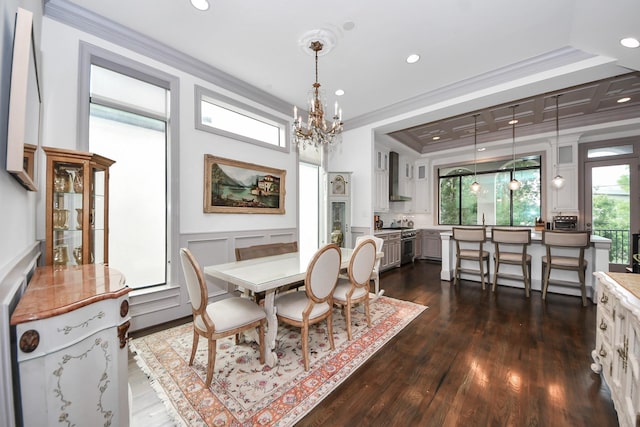 403 W Pierce St W, Houston, TX 77019 - dining space featuring ornamental molding, a chandelier, a decorative wall, plenty of natural light, and dark wood-type flooring