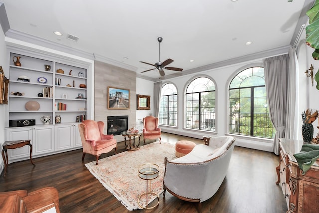 403 W Pierce St W, Houston, TX 77019 - living area with ornamental molding, plenty of natural light, a tile fireplace, dark wood-style flooring, and recessed lighting