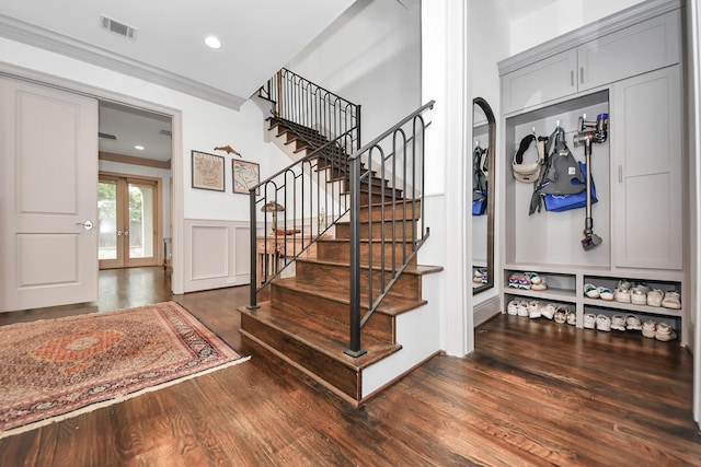 403 W Pierce St W, Houston, TX 77019 - stairs with wood finished floors, wainscoting, ornamental molding, french doors, and recessed lighting