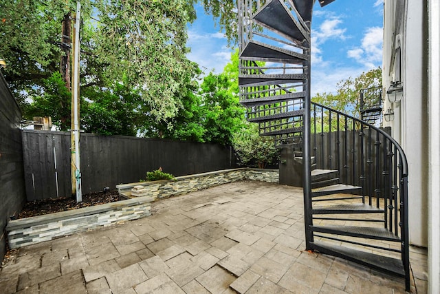 403 W Pierce St W, Houston, TX 77019 - view of patio with stairway and fence