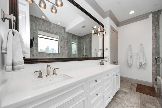 403 W Pierce St W, Houston, TX 77019 - bathroom with a shower stall, double vanity, recessed lighting, ornamental molding, and baseboards