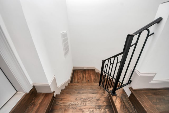 403 W Pierce St W, Houston, TX 77019 - staircase featuring wood finished floors