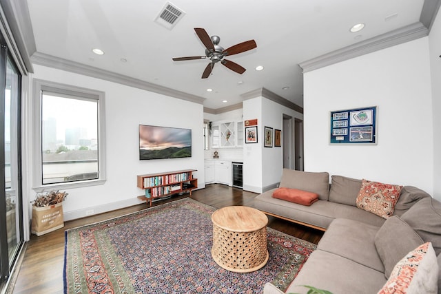403 W Pierce St W, Houston, TX 77019 - living area featuring wine cooler, dark wood-style floors, ceiling fan, ornamental molding, and recessed lighting