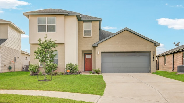traditional-style house featuring central AC, a front yard, brick siding, concrete driveway, and an attached garage