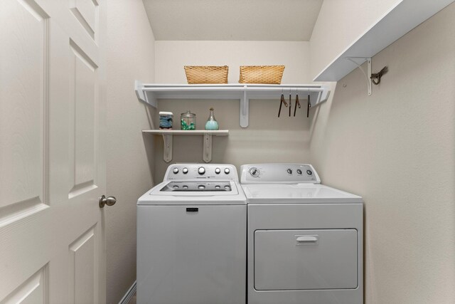 laundry room featuring laundry area and washing machine and dryer