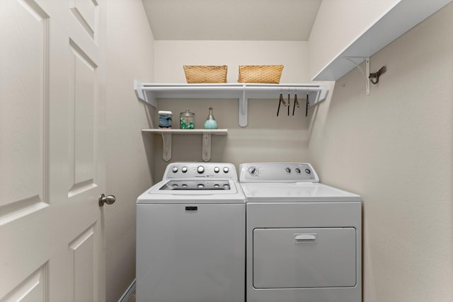 13510 Marblepointe Ln, Cypress, TX 77429 - clothes washing area with washing machine and clothes dryer