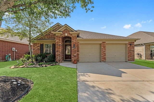 view of front of home with concrete driveway, brick siding, a front lawn, and a garage