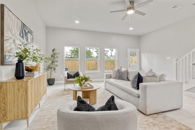 8161 Crestview Dr, Houston, TX 77028 - living room with stairs, ceiling fan, recessed lighting, and light tile patterned floors