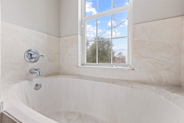 bathroom featuring a bath
