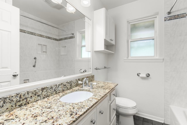 bathroom with visible vents, tile patterned flooring, vanity, toilet, and bathing tub / shower combination