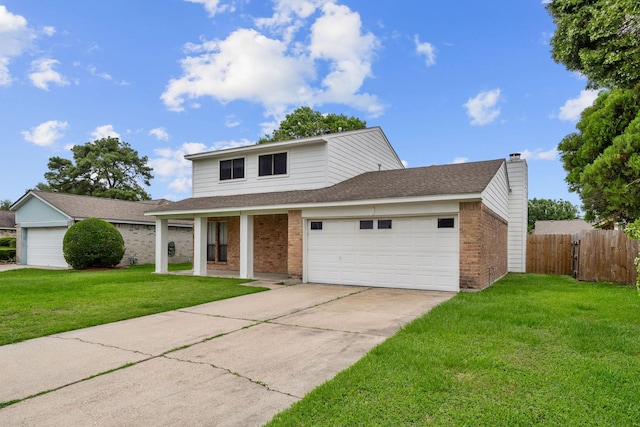 traditional home featuring fence, a garage, a front lawn, and brick siding
