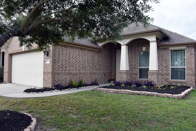 3009 Kurth Canyon Ct, League City, TX 77573 - view of front of house with brick siding, a garage, a front yard, concrete driveway, and a shingled roof