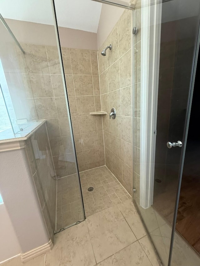 3009 Kurth Canyon Ct, League City, TX 77573 - bathroom featuring a shower stall and tile patterned flooring