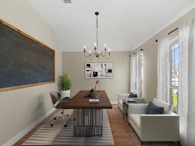 3009 Kurth Canyon Ct, League City, TX 77573 - dining space with a chandelier, wood finished floors, vaulted ceiling, baseboards, and an office area