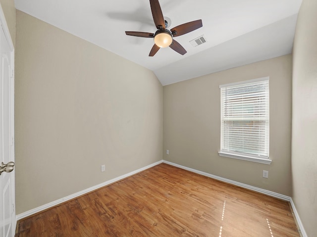 3009 Kurth Canyon Ct, League City, TX 77573 - empty room with ceiling fan, vaulted ceiling, baseboards, and light wood finished floors